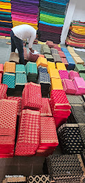 Stack of fancy designer blouse fabric with jacquard and dobby weaves